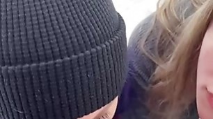 two whores sucking cock in the cold outside