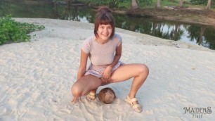 A Shy Girl Squirts a Small Trickle of Pee on a Coconut