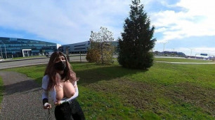 Crossdresser flashing boobs by the side of a busy highway