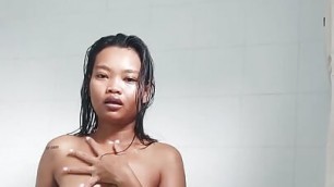 Thai cute girl play her body in bathroom